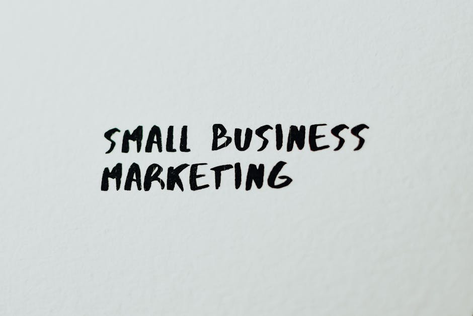Text Small Business Marketing written on white paper